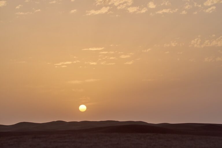 silhouette of mountains during sunset