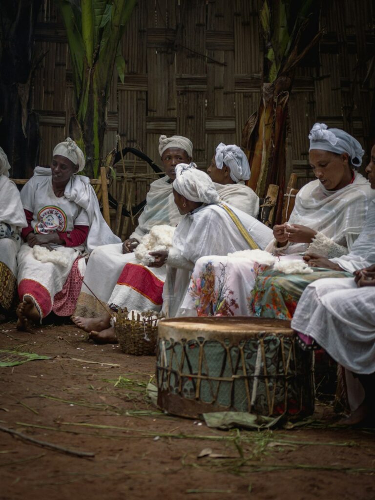 a group of women sitting next to each other