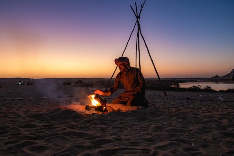 Man by a campfire