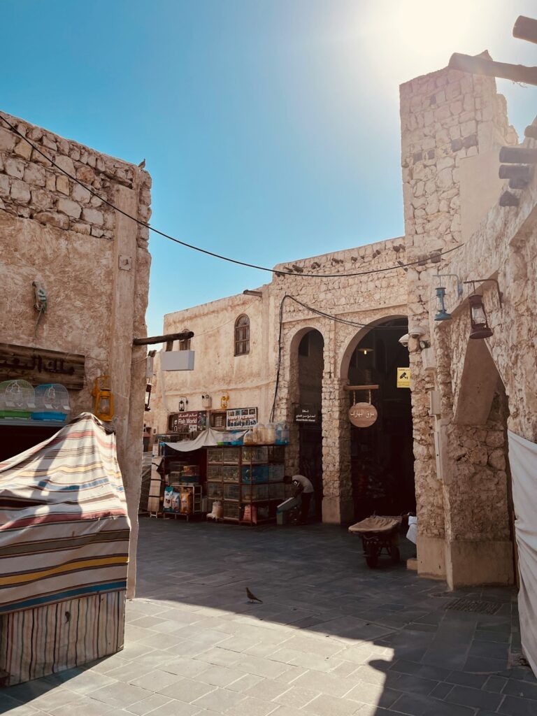 A picture of a street with a building in the background