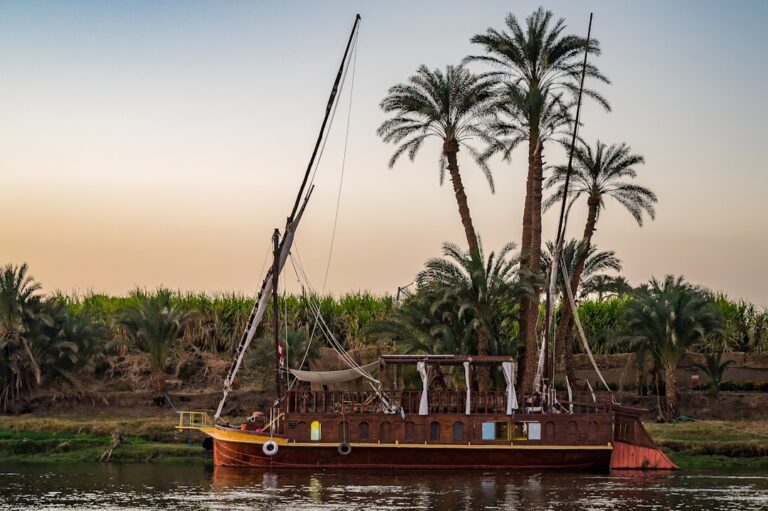 A boat floating on top of a body of water