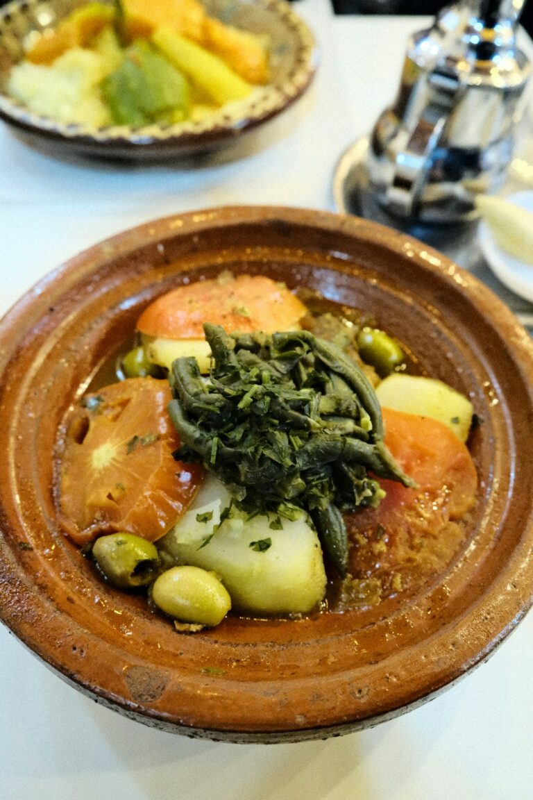 A bowl of food is sitting on a table